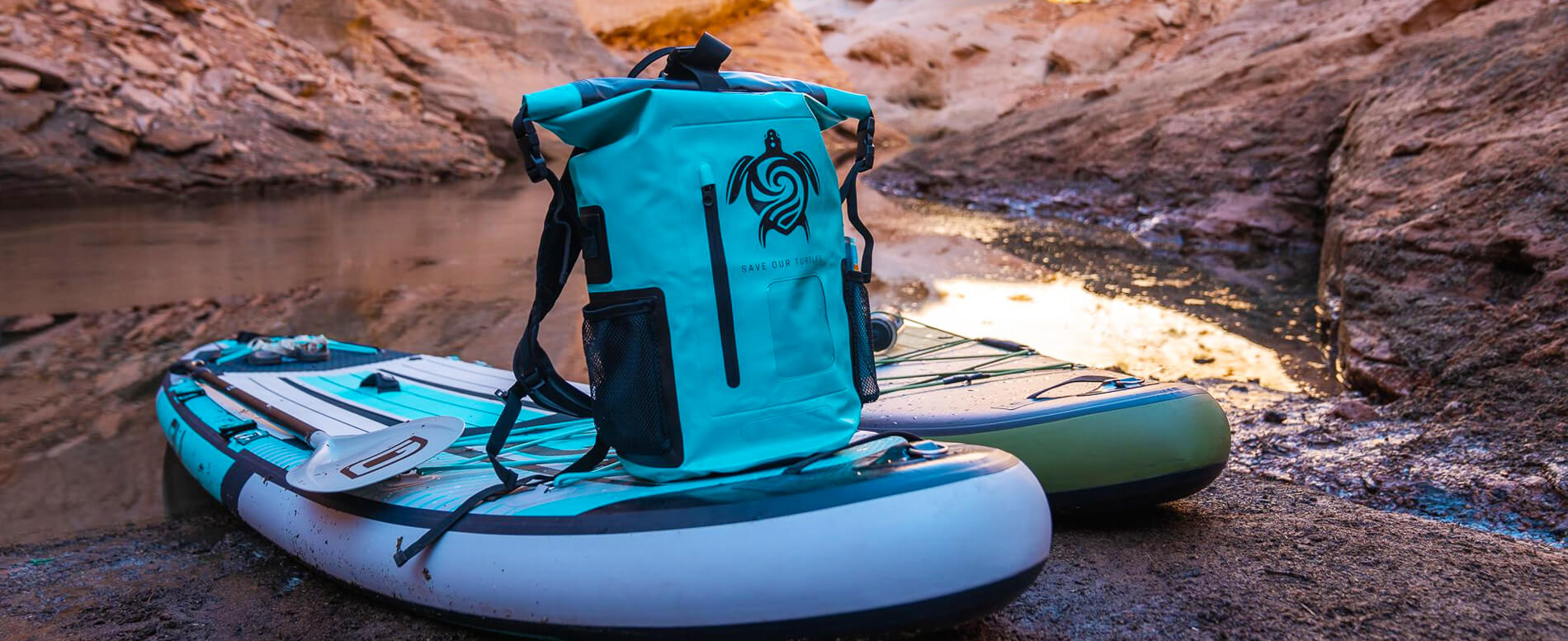 GILI waterproof backpack on a GILI board