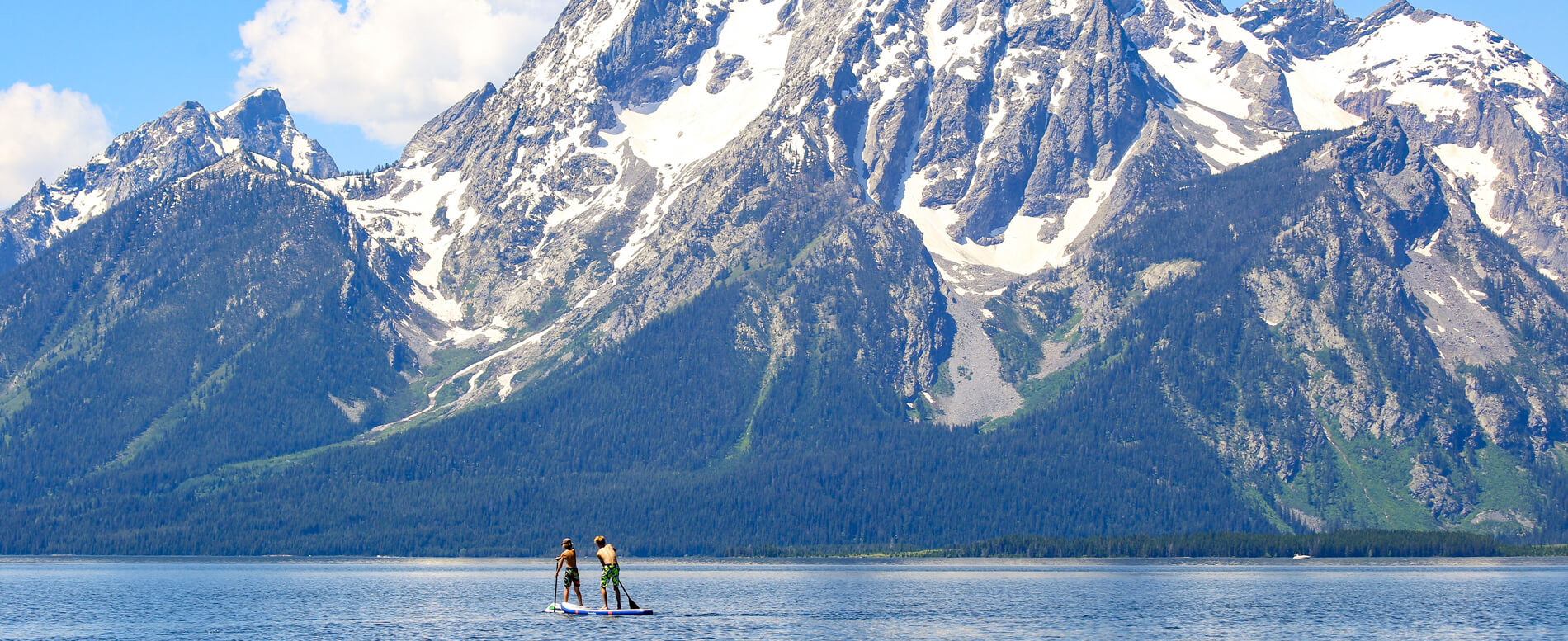 Two man paddle boarding in Wyoming
